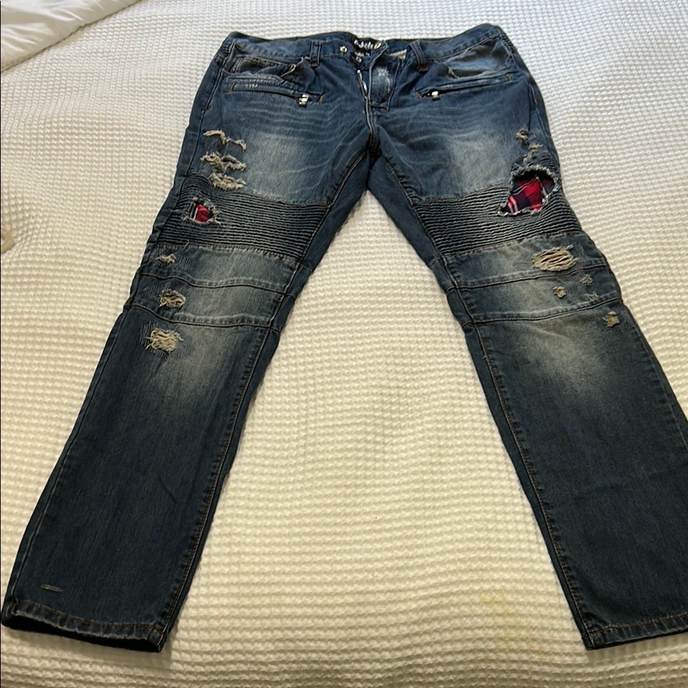 Distressed Blue Jeans with Red Accents
